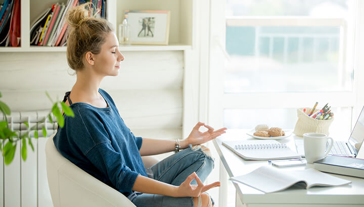 6 Chair Yoga Poses To Do While Sitting At Your Desk